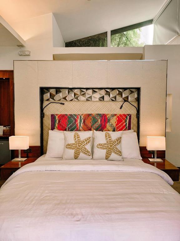 Postel nebo postele na pokoji v ubytování Banig Beach Resort El Nido