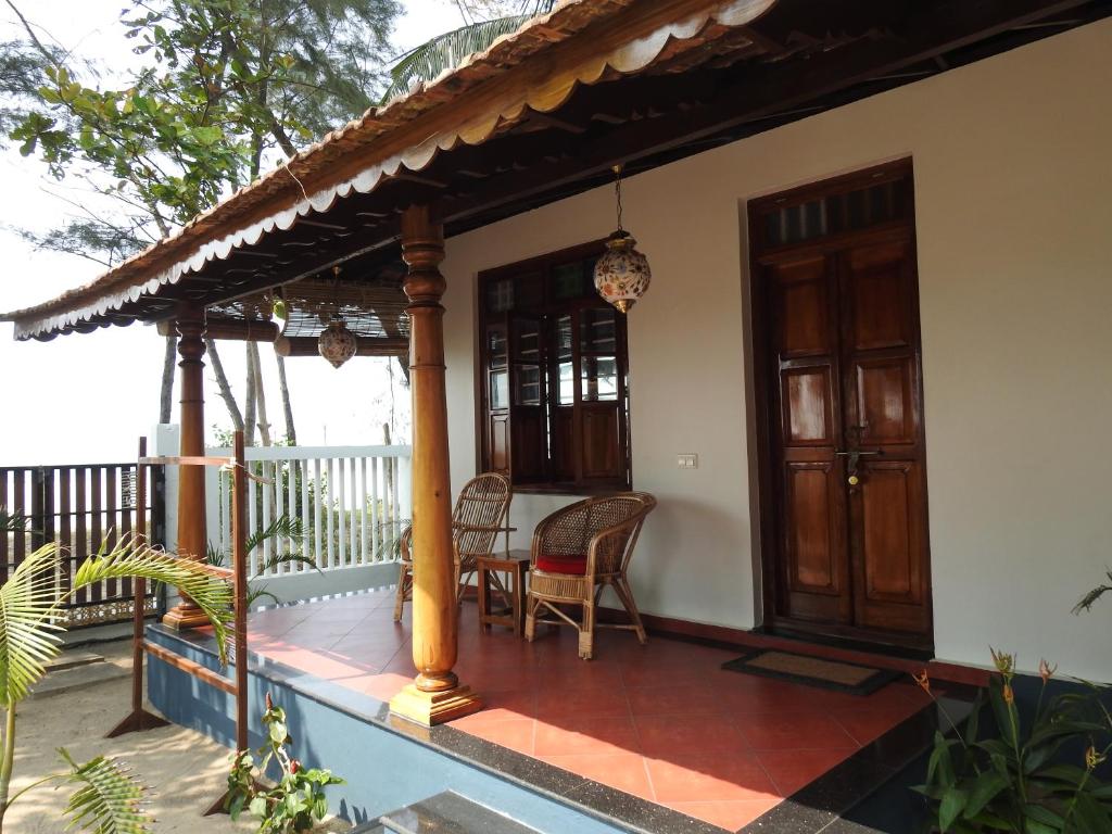 Balkón nebo terasa v ubytování Alleppey Beach Garden