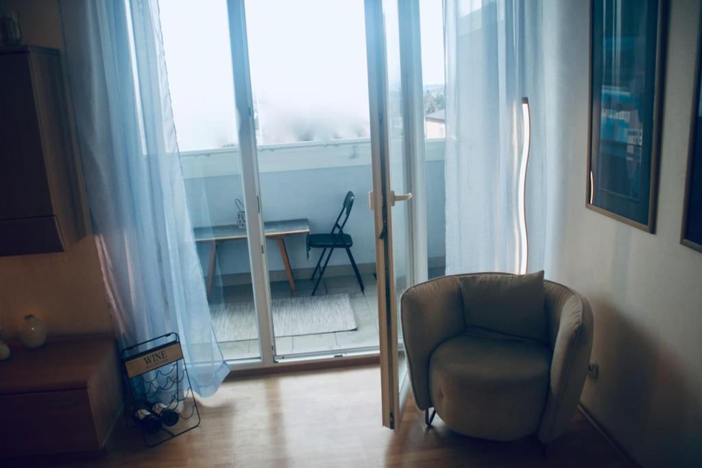 A seating area at JASMINE APARTMENT - FREE PARKING - CITY CENTER - SKIBUS - TATRALANDIA 5km