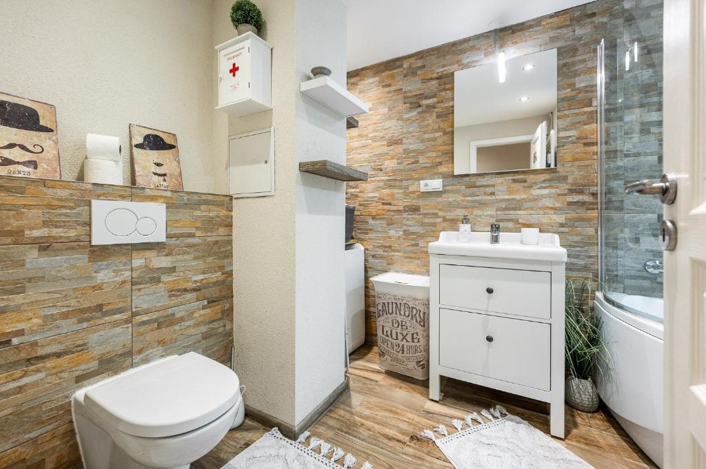 Kúpeľňa v ubytovaní Old Town Apartment Podtatranskeho