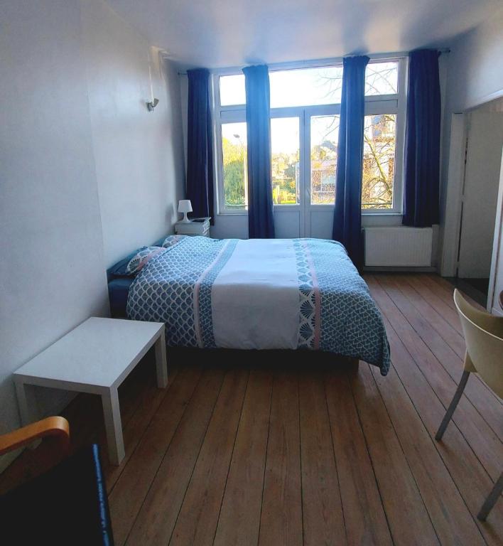 Postel nebo postele na pokoji v ubytování Studio confort Verviers