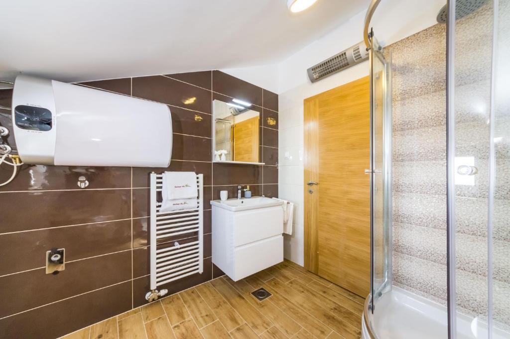 Koupelna v ubytování Apartment Alex 1