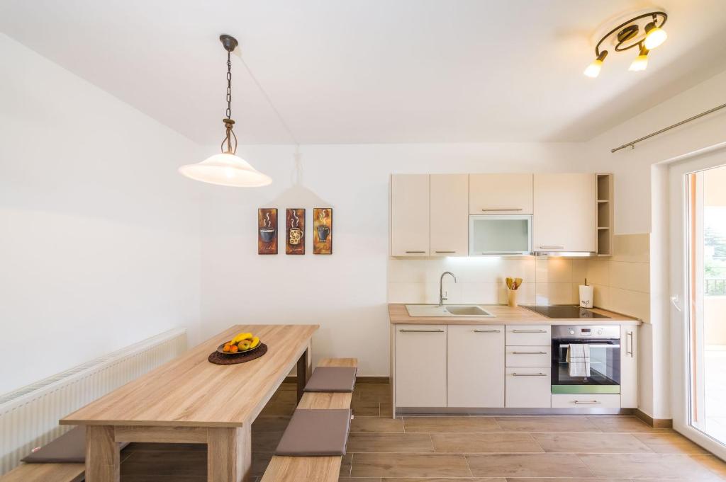 Kuchyň nebo kuchyňský kout v ubytování Apartment Alex 1