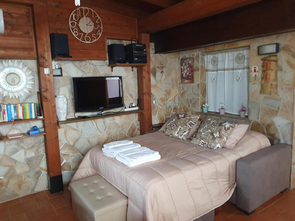 A television and/or entertainment centre at La Dependance delle Mimose