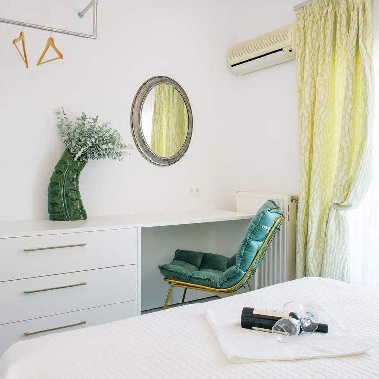 Postel nebo postele na pokoji v ubytování Hotel Papanikolaou