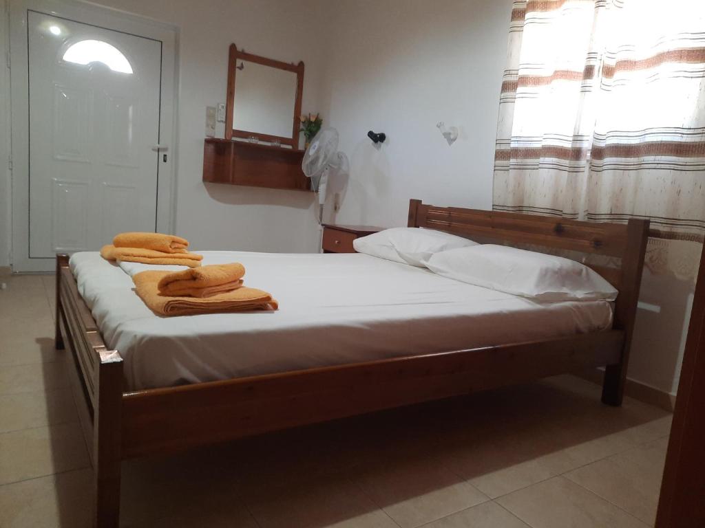 Postel nebo postele na pokoji v ubytování Voula Beach