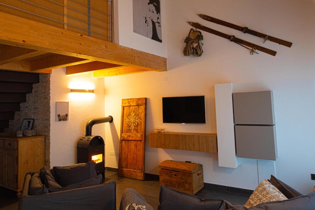 Telewizja i/lub zestaw kina domowego w obiekcie Relax in Pineta