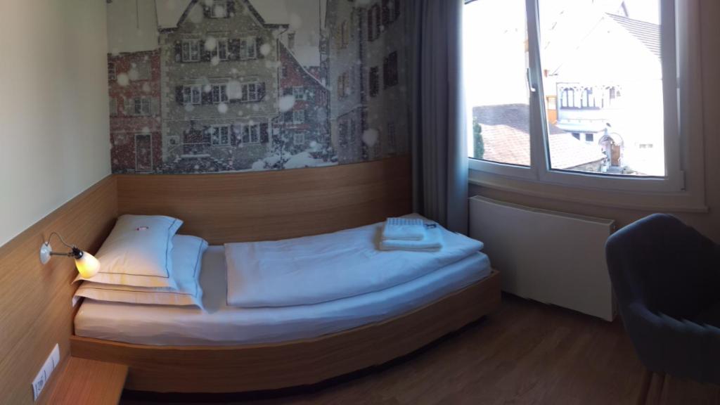 Postel nebo postele na pokoji v ubytování Landgasthof Hirschen