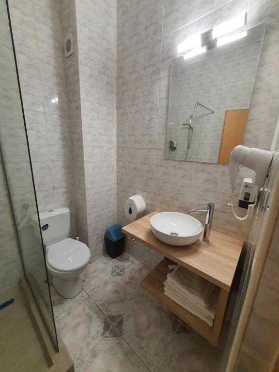 Koupelna v ubytování Hotel Mures