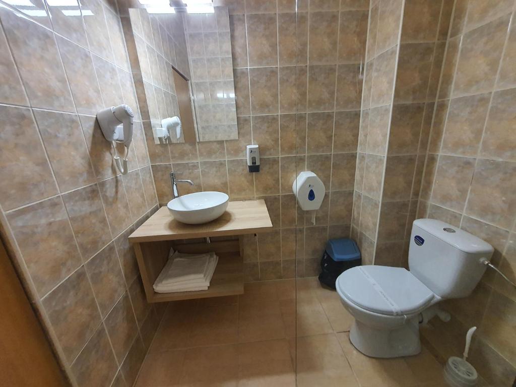 Koupelna v ubytování Hotel Mures