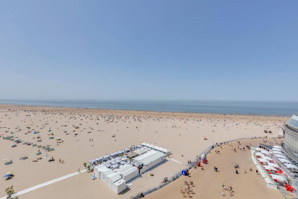 an overhead view of a beach with people at Luxury Suite with Seaview in Ostend