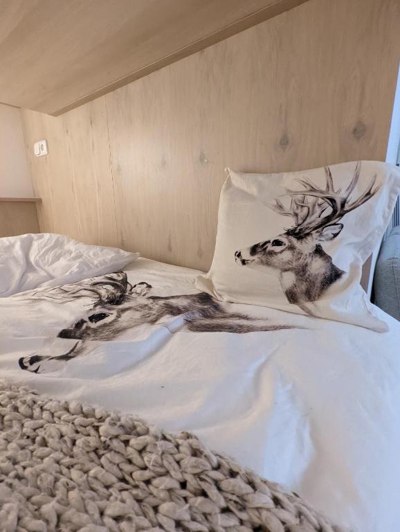 Postel nebo postele na pokoji v ubytování JASMIN HOME Apartments