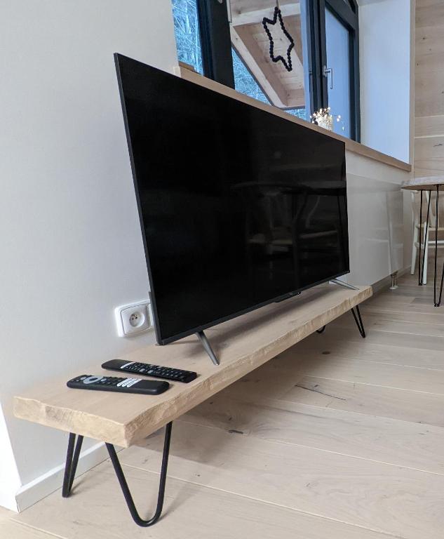 TV a/nebo společenská místnost v ubytování JASMIN HOME Apartments