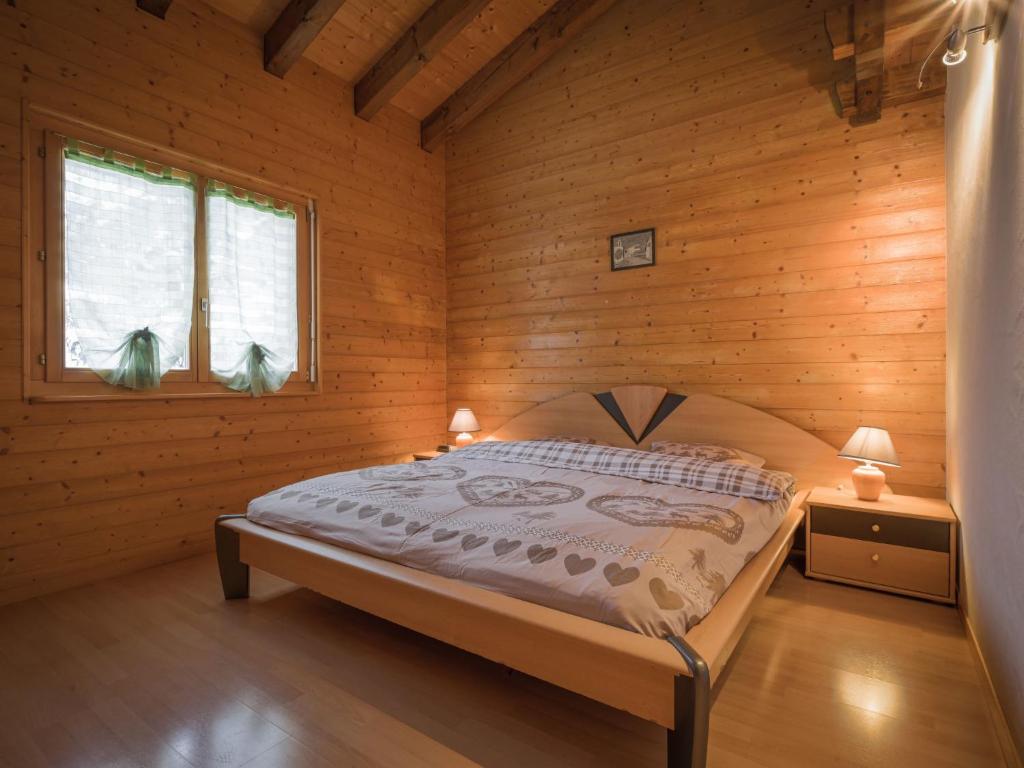Postel nebo postele na pokoji v ubytování Apartment Heida A 4 by Interhome