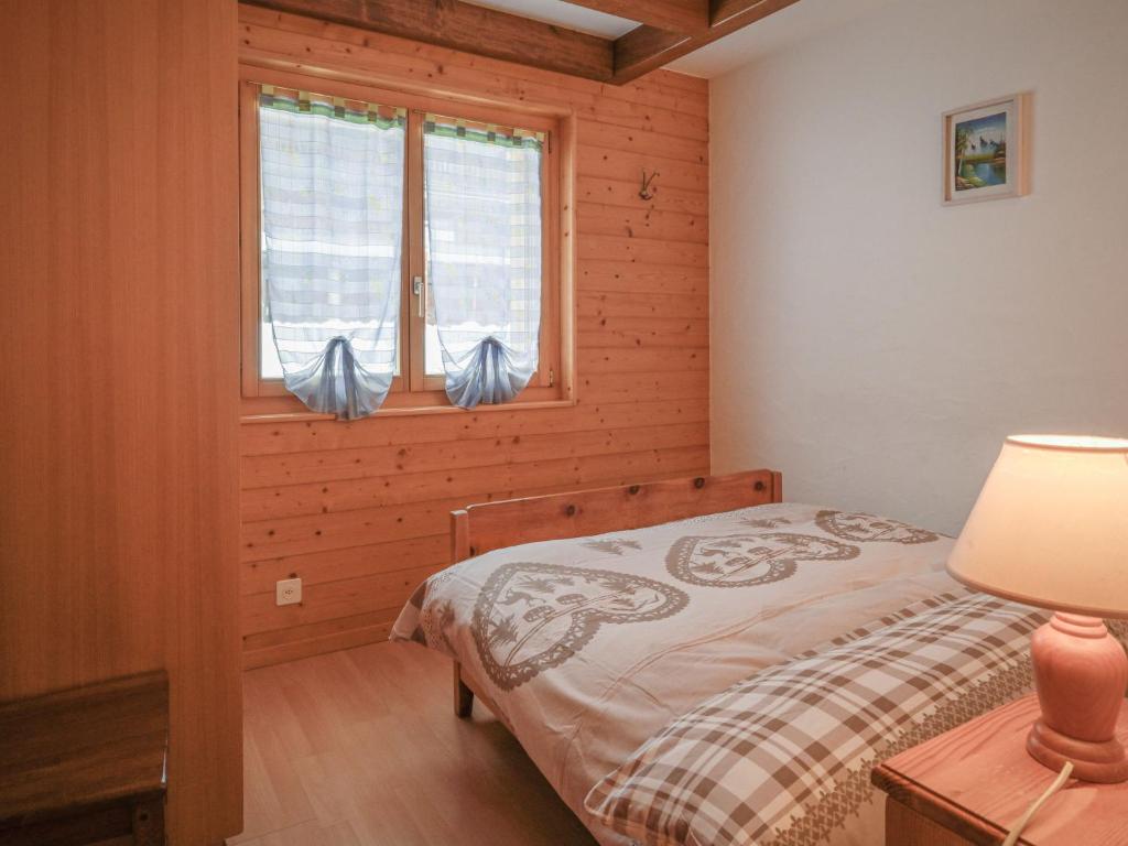 Postel nebo postele na pokoji v ubytování Apartment Heida A 4 by Interhome