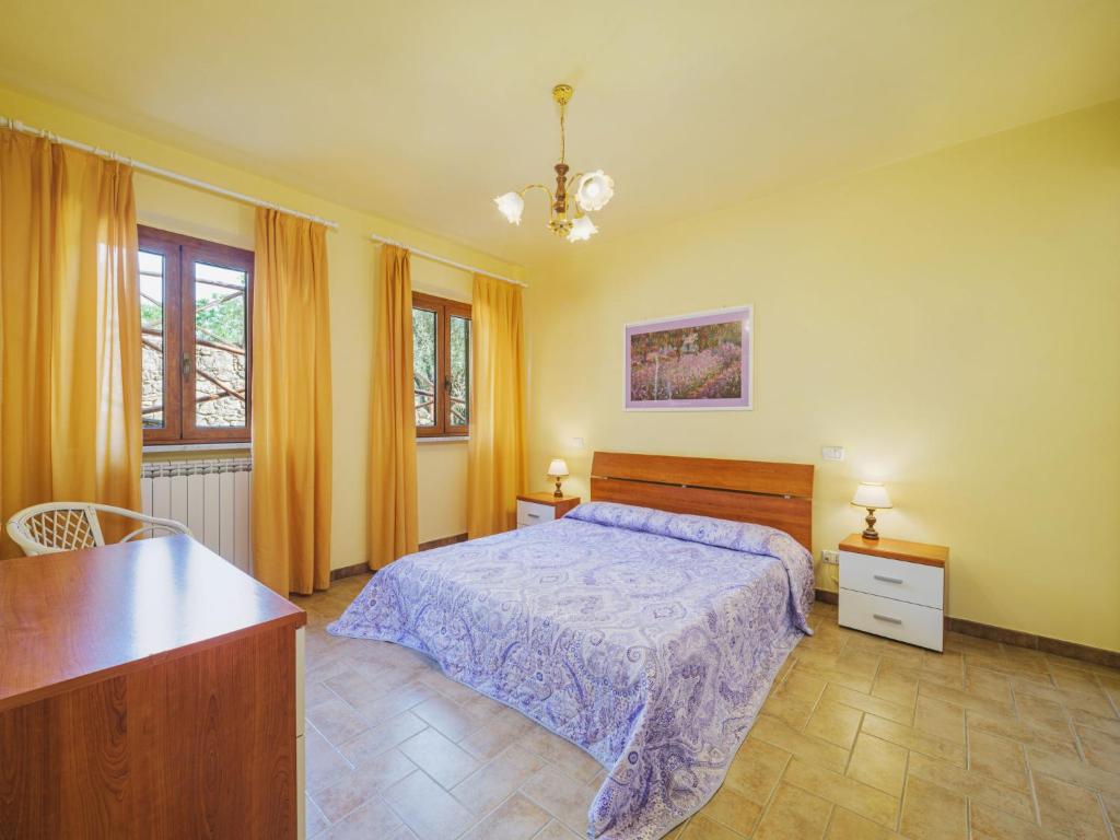 Łóżko lub łóżka w pokoju w obiekcie Apartment Ca` del Lovi-3 by Interhome