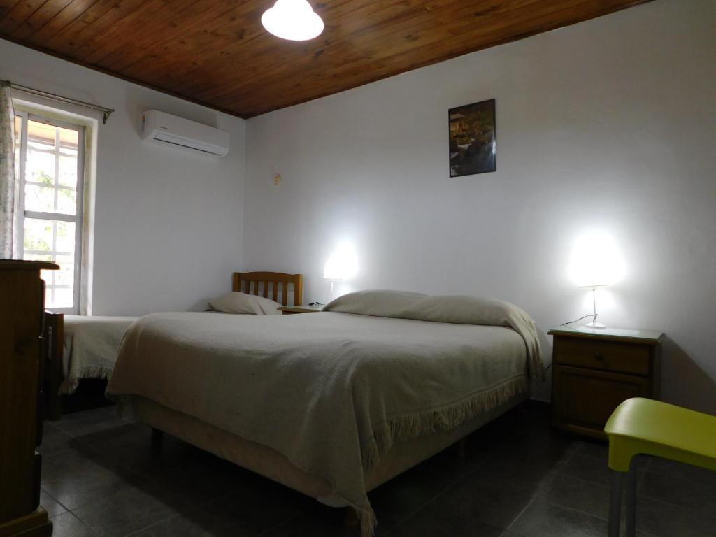 Letto o letti in una camera di Hostería Teuly
