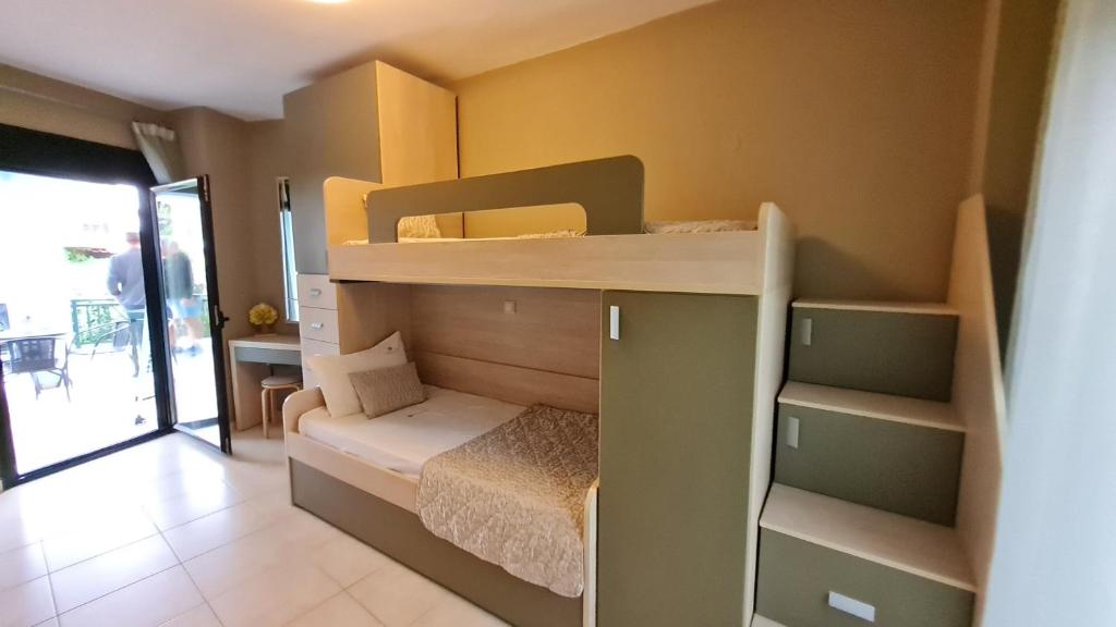 Postel nebo postele na pokoji v ubytování Toroni Pearl