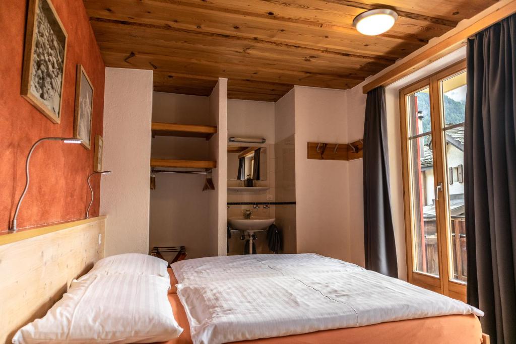 Postel nebo postele na pokoji v ubytování Hotel Bahnhof