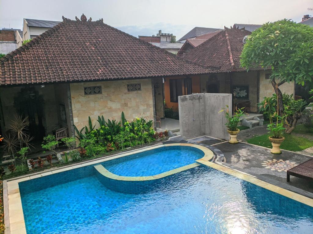 Bazén v ubytování Taman Sari Cottages nebo v jeho okolí
