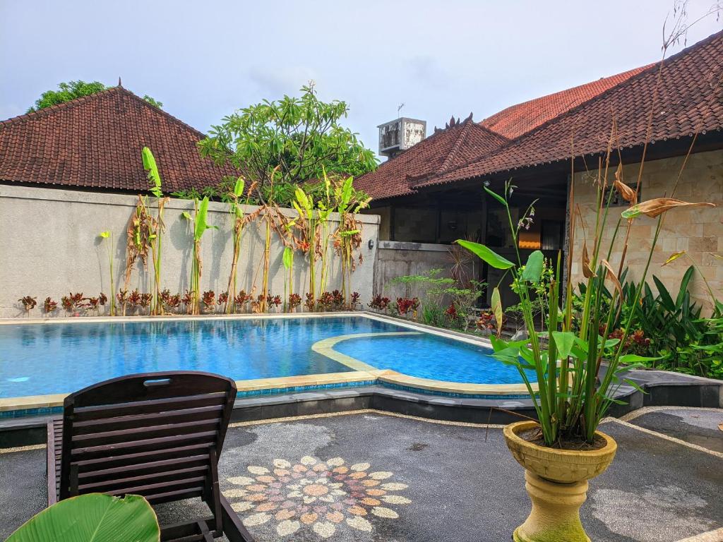 Bazén v ubytování Taman Sari Cottages nebo v jeho okolí