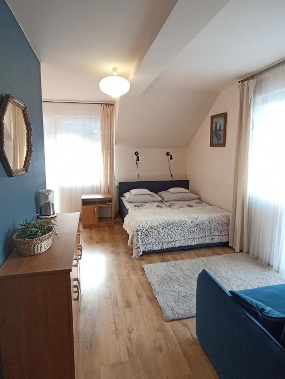 Posteľ alebo postele v izbe v ubytovaní Szarotka Pienińska