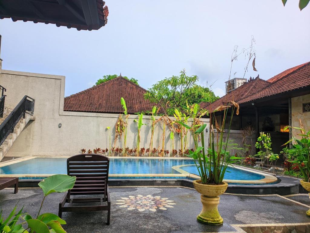 Bazén v ubytování Taman Sari Cottages nebo v jeho okolí