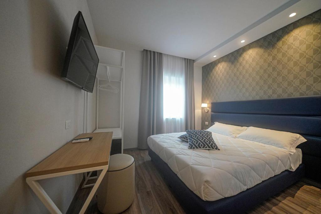 TV a/nebo společenská místnost v ubytování Hotel Valle del Fiora