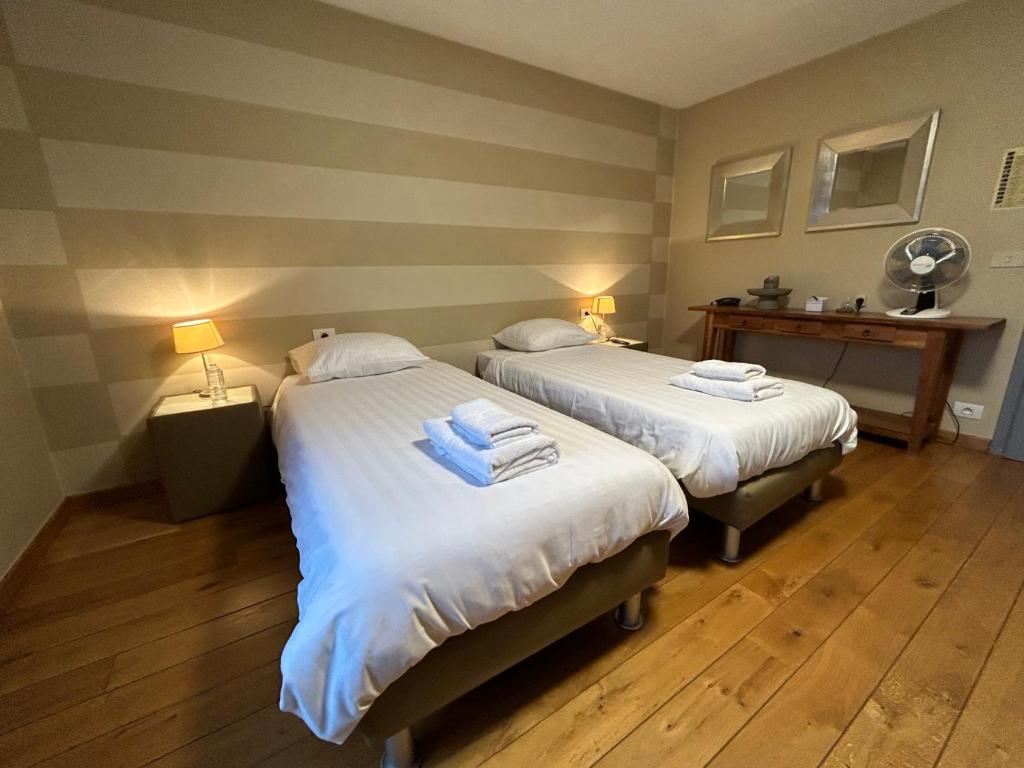 Postel nebo postele na pokoji v ubytování Race & Rooms