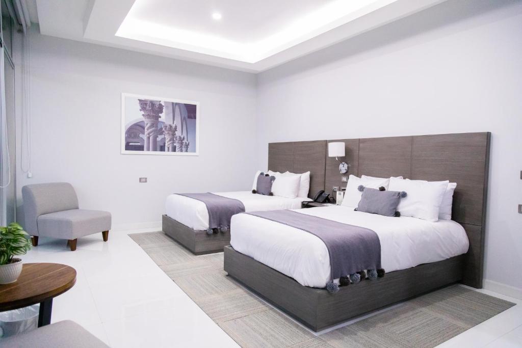 Postel nebo postele na pokoji v ubytování Hotel GRALTA