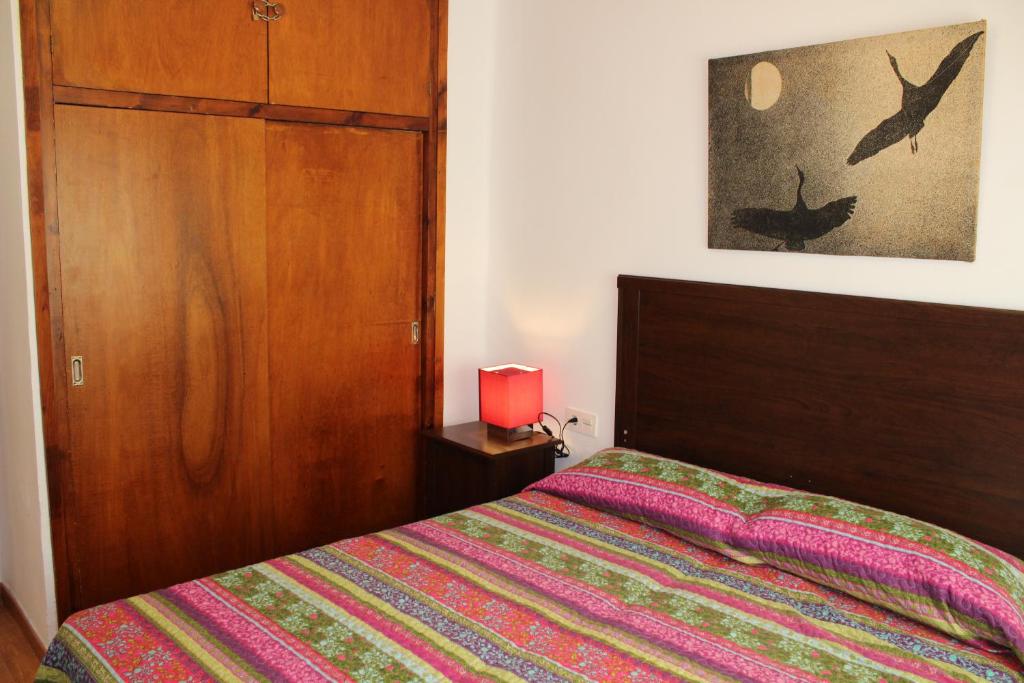 Posteľ alebo postele v izbe v ubytovaní Cozy apartment Torrecilla Beach