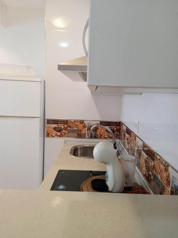 Kuchyňa alebo kuchynka v ubytovaní Cozy apartment Torrecilla Beach