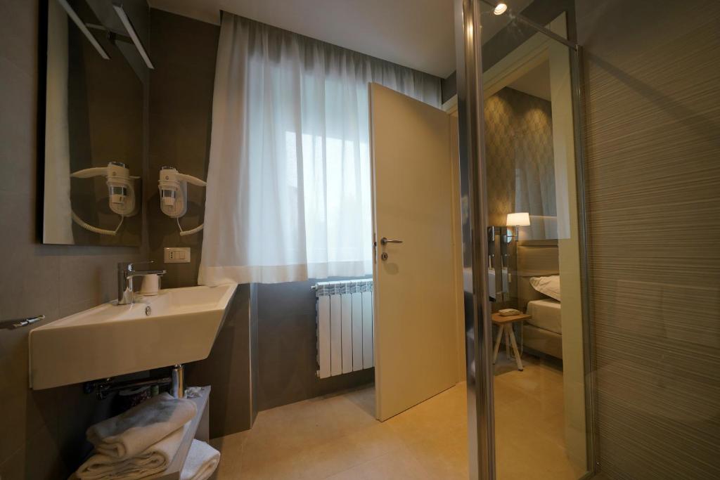 Koupelna v ubytování Hotel Valle del Fiora