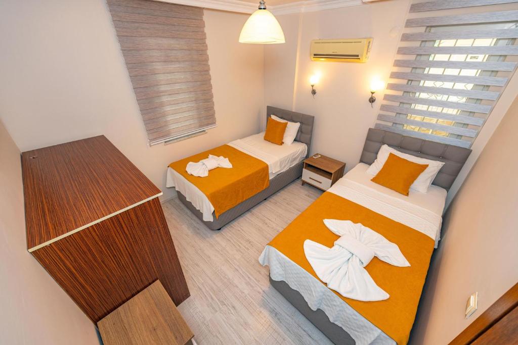 Postel nebo postele na pokoji v ubytování Villa Yasam Park - Luxury 8 Person - Fethiye Calis Beach 90mt