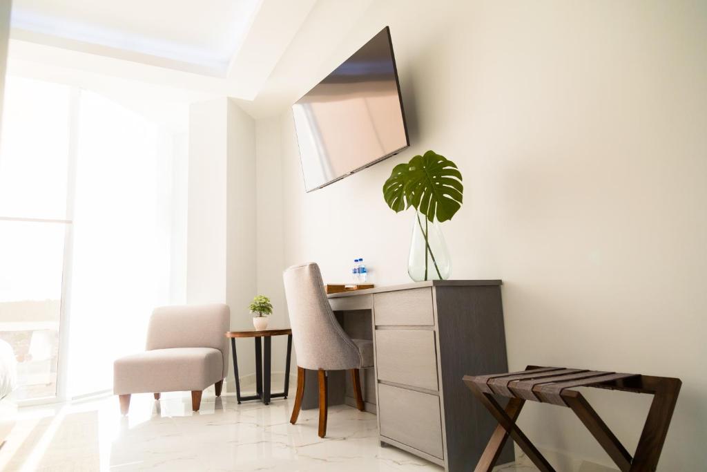 TV a/nebo společenská místnost v ubytování Hotel GRALTA