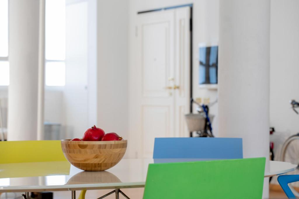 A seating area at GetTheKey Fiore Giallo Apartment