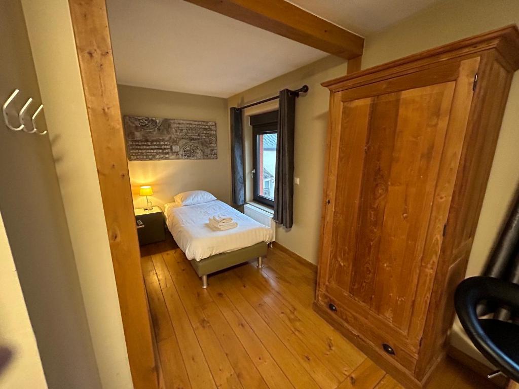 Postel nebo postele na pokoji v ubytování Race & Rooms