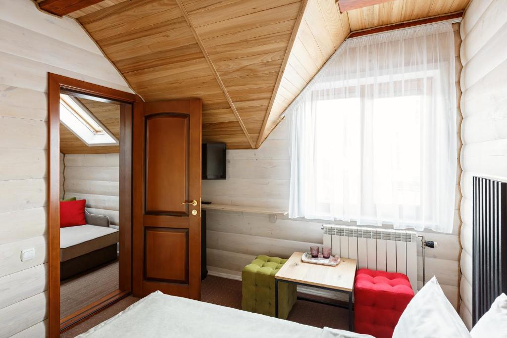 Postel nebo postele na pokoji v ubytování Korona Hotel&SPA