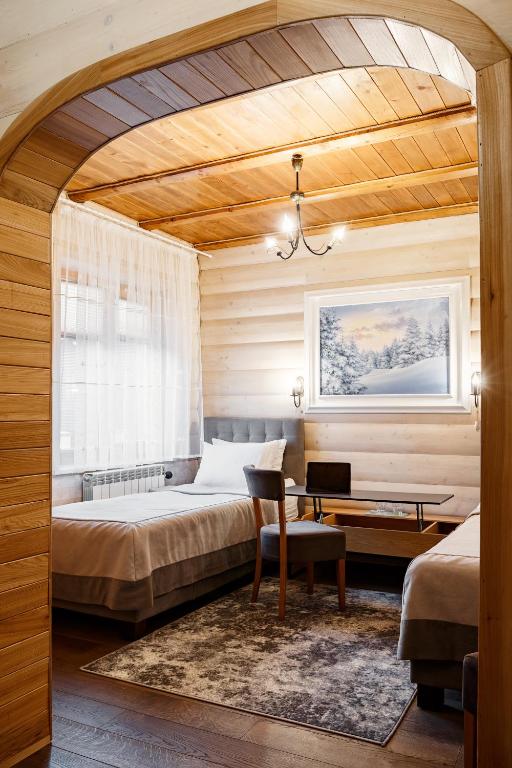 Postel nebo postele na pokoji v ubytování Korona Hotel&SPA