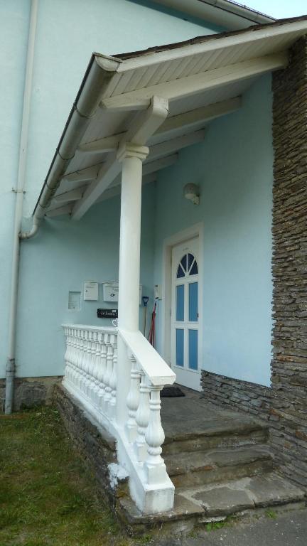 a white porch with awning on a house at Lemmerer Homestay in Sankt Lorenzen bei Knittelfeld