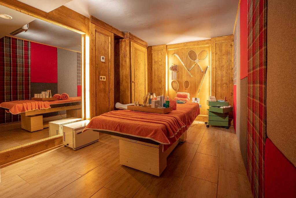 Postel nebo postele na pokoji v ubytování Magic Megève Bois