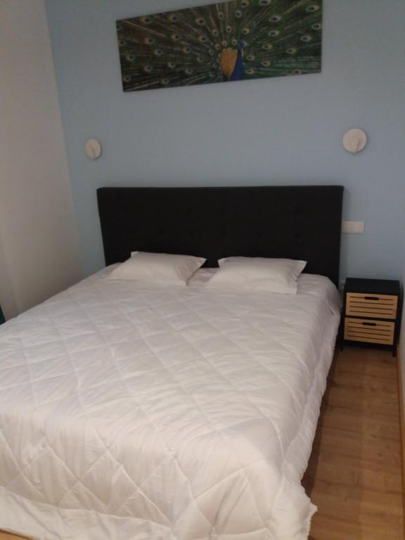 Postel nebo postele na pokoji v ubytování LPA PEREIRA Hotel restaurante