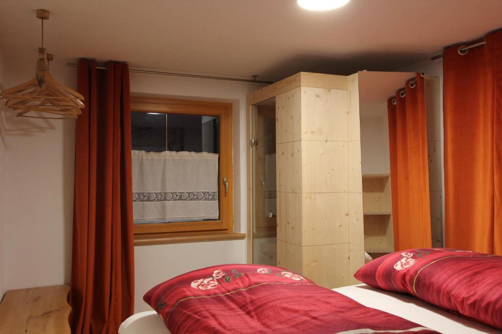 Postel nebo postele na pokoji v ubytování Haus am Rain