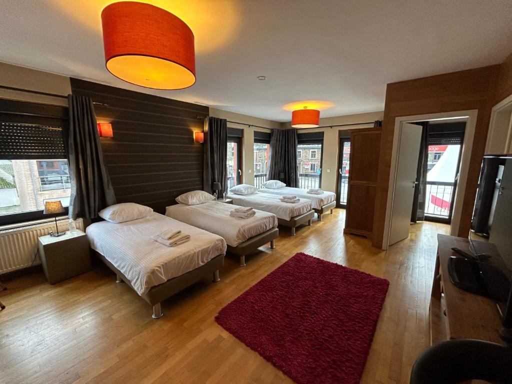 Postel nebo postele na pokoji v ubytování Race & Rooms