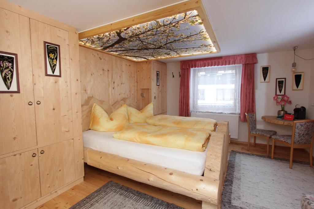 Postel nebo postele na pokoji v ubytování Haus am Rain