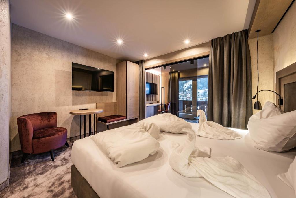 Postel nebo postele na pokoji v ubytování Hotel Gasthof Brücke
