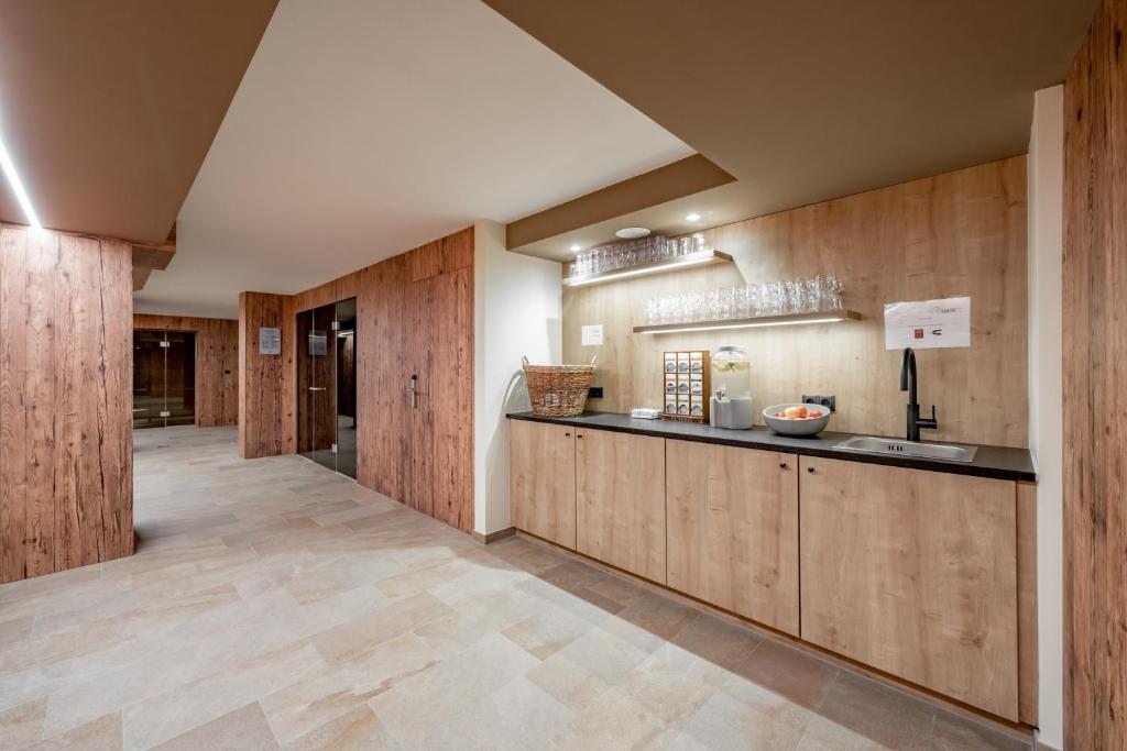 Kuchyň nebo kuchyňský kout v ubytování Alpenhotel Zimba