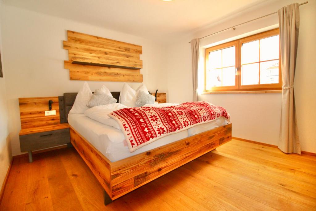 Postel nebo postele na pokoji v ubytování Chalet Mama