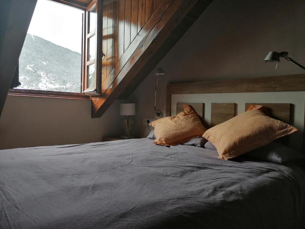 Posteľ alebo postele v izbe v ubytovaní Precioso triplex con jardín y Wifi Puig Falcó 1