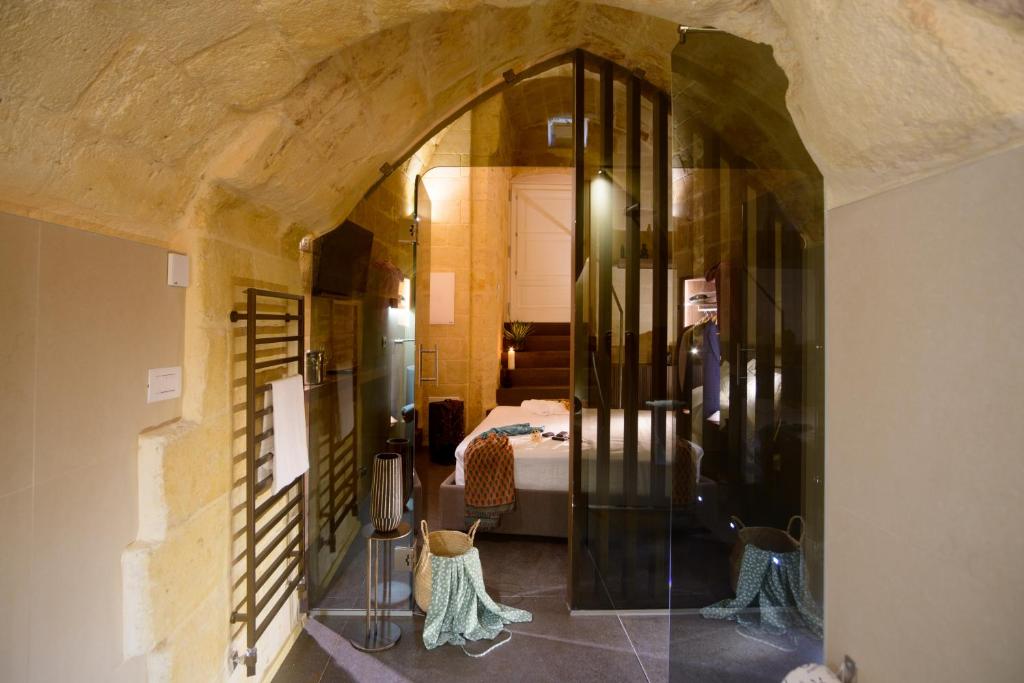 Postel nebo postele na pokoji v ubytování Le Malve Cave Retreat